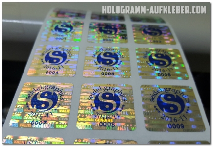 hologrammetiketten, hologramm etiketten, sicherheistetiketten, hologramme mit ihrem logo, hologramm aufkleber, original, genuine, individuell, hologramm aufkleber individuell,  hologrammetiketten individuell, selbstzerstörerisch, hologramm folie, hologram